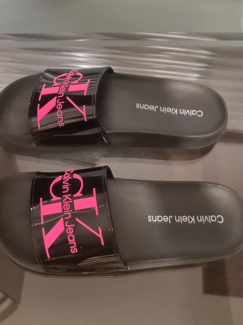 Calvin Klein Jeans Black Slide Sandals with Hot Pink Logo and White And Black